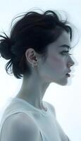 A woman with a ponytail in profile photo