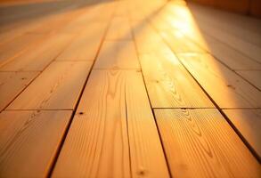 A wooden floor with sunlight shining on it photo