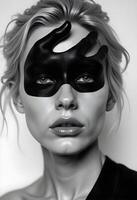 A woman with black and white makeup and a black mask photo