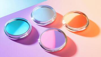 Vivid pastel eyeshadow palette featuring four circular colors on gradient background with silver rims and reflective highlights photo