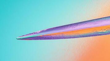 Vibrant macro close-up of a iridescent purple needle on a gradient background of orange, teal, and cyan in abstract conceptual art photo