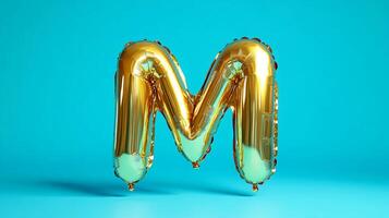 Golden foil balloon shaped like the letter M, floating against a bright turquoise background, adding a festive and playful touch to celebrations and events photo