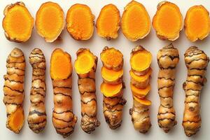 Turmeric Root Slices Displayed in Rows Showing Texture and Color photo