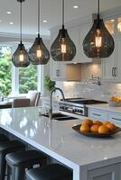 Modern kitchen island with pendant lights and quartz countertop photo