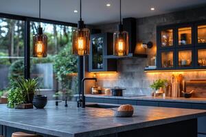 Modern Kitchen Island with Warm Lighting and Greenery photo