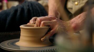 Man hands sculpting clay modeling professional male master potter pottery creating formed vase jug pot craftsman art handmade artisan skill craft earthenware ceramic product workshop clayware artwork video