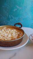 Delicious turkish menemen and tea served on a table video