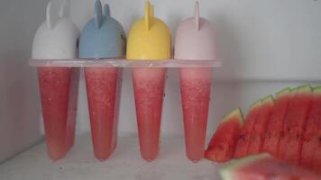 Making refreshing watermelon popsicles at home video