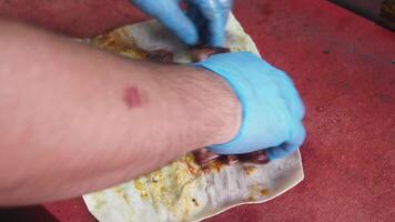 Grilled Meat Skewers on Flatbread Placed on a Vibrant Red Background video