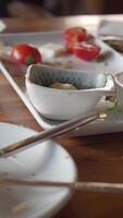 Enjoying delicious food in a lively restaurant setting video