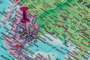 Pinpointing a location on the map of Mexico photo