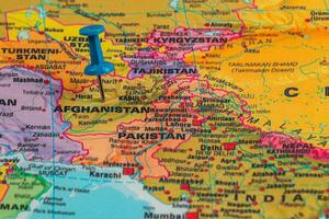 Map highlighting Afghanistan's location with pushpin marker photo