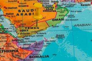 Map highlighting Yemen with a pin located in the Middle East photo