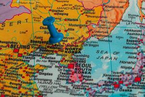 Map detailing North and South Korea with a blue pin photo