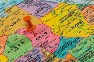 Map of Africa highlighting Chad with a pushpin marker photo