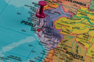 Map highlighting Peru with pin near Lima location details photo