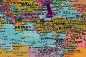 Pinpointing Turkey on a colorful map of Europe and Asia photo