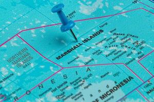 Detailed map of the Marshall Islands with a blue pushpin mark photo