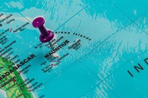 Pinpointing Mauritius on a detailed world map photo