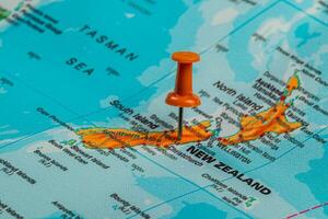 Pinpointing a location on the map of New Zealand photo