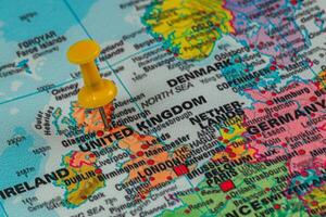 Map highlighting United Kingdom with pin marked at Glasgow photo