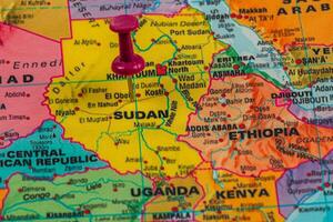 Exploring Sudan's geography with a bright red pushpin marker photo