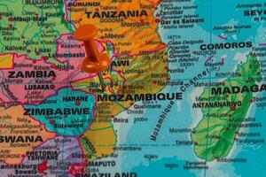 Pin marking location in Mozambique on a colorful map photo