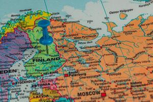 Pinpointing Finland on a colorful map of Europe photo