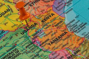 Exploring Uganda on a vibrant map with a pinpoint marker photo