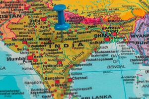 Map of India with a blue pushpin marking a specific location photo