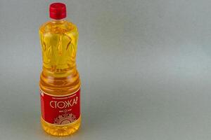 Lviv Ukraine 05.22.25 Cooking oil bottle on a neutral background photo