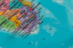 Location marked on a colorful map of southern Africa photo