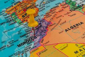 Pinpointing a location on a map of Morocco in North Africa photo