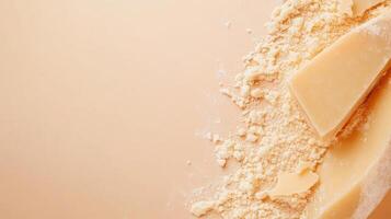 Creamy white chocolate pieces and shavings arranged on a smooth surface showcasing a dessert ingredient photo