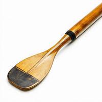 A wooden paddle with a black handle photo