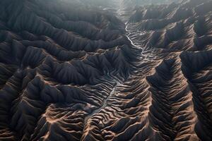 An aerial view of a mountain range with a river photo