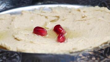 Delicious dip preparation with pomegranate seeds video