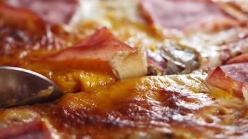Enjoying delicious pizza with toppings at a local diner video