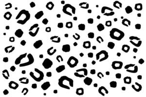 Abstract black and white leopard print pattern with varying shapes and sizes on a white background vector