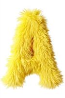 A fluffy yellow letter A is centered on a white background, emphasizing its bright color and soft texture while adding a cheerful vibe photo
