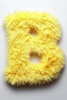 A vibrant yellow letter B made of soft fluffy material stands out against a clean white background, adding a touch of fun and color photo