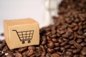 Box with shopping cart logo symbol on coffee beans, Import Export Shopping online or eCommerce delivery service store product shipping, trade photo