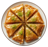 Traditional baklava pastry cut into triangular slices arranged in circle, isolated on a transparent background png