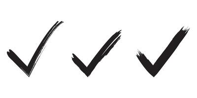 Set of check marks drawn with brush strokes. Approval symbol. Black check mark symbol on isolated background. . vector