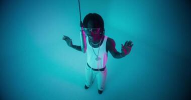 Top view of the singing and dancing rapper. photo