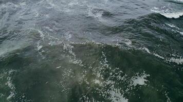 View of the foaming sea waves at high tide. Drone , only sea waves in the frame photo