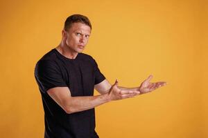 Copy space concept,,, showing,, pointing. Man is against background in the studio photo
