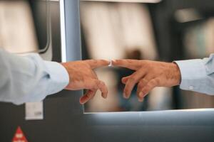 Close, up, view, touching smart mirror. Man is in the hardware shop photo