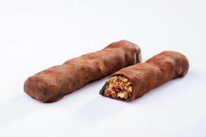 Chocolate bars lie ,on a white surface, isolated photo