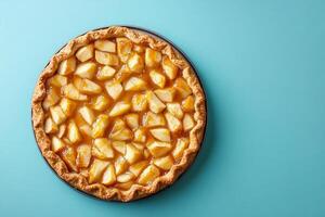 Top View Of Apple Pie With Caramel Sauce On Vibrant Background With Copy Space, Food Photography photo